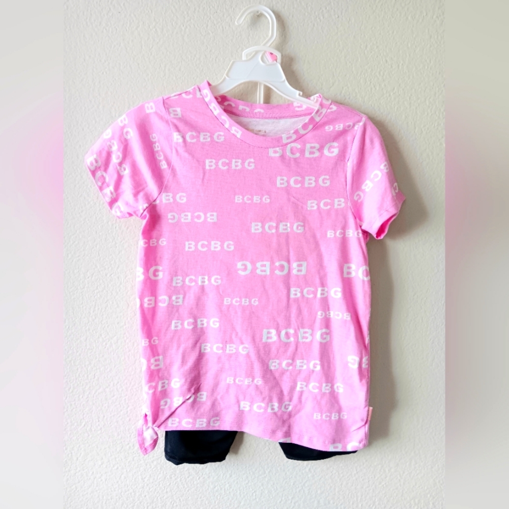 BCBGirls pink short sleeve t-shirt with tie  and black/pink shorts. / Size: 10
